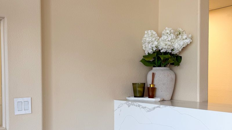 The reception counter, with flowers on it.